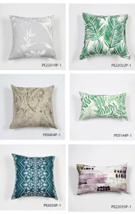 Detalles de varias fundas de cojín estampadas con motivos florales y geométricos.