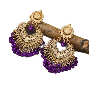 Bohemian hollow gold tone chandelier earrings with elegant purple beaded fringe drops for women