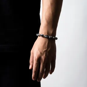 Tibetan style Dzi bead bracelet for men and women, hip hop fashion luxury wrist jewelry accessory.