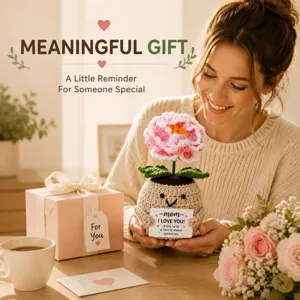 Handmade crochet peony flower potted plant with positive encouragement card and gift box detail.