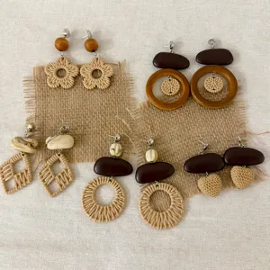 Bohemian rattan and wooden woven flower earrings detail, natural beach holiday style jewelry.