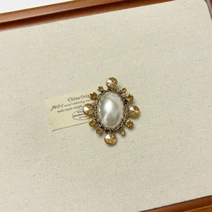 Vintage baroque pearl rhinestone brooch detail shot, elegant court style pin for women's outfits.