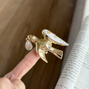Retro gold bird metal ring with pearl drop and white oil wing, chic adjustable open ring.