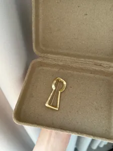 Minimalist vintage style metal keyhole brooch, exquisite niche design accessory for women.