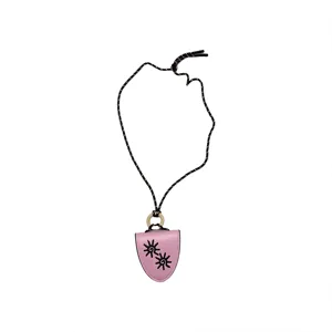 Pink leather sunglasses holder necklace with sun cutout pendant and long cord accessory.
