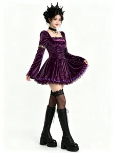 Gothic purple velvet dress detail showing intricate lace trim, long sleeves and corset bodice.