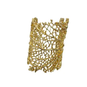 Chic gold metallic open cuff bracelet with unique organic net hollow design for women.
