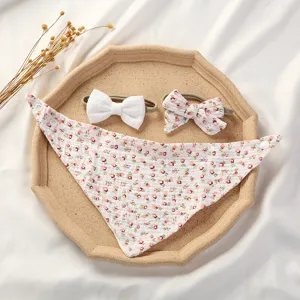 Soft floral cotton baby bandana bib with matching bow headband set for newborns