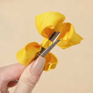 Pince à cheveux nœud en ruban gros-grain jaune vif avec clip crocodile argenté