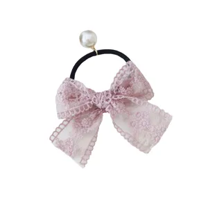 Elegant pink lace bow hair scrunchie with pearl charm for fairy forest style aesthetics.