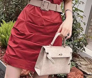 Detail view of women wide waist belt cincher stylish design accessory lifestyle presentation photo