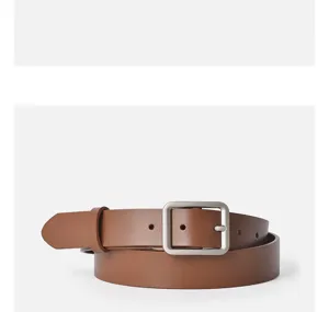 Minimalist brown leather belt for women featuring a sleek silver square buckle for daily wear.