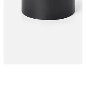 Detailed view of the premium black leather belt, showing fine texture and sleek finish.