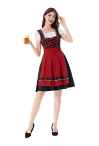 Traditional German Dirndl dress for women, red and black plaid bodice with white blouse and apron.