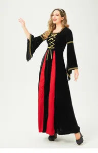 Medieval renaissance gothic witch dress detail showcasing black velvet fabric with elegant gold lacing.