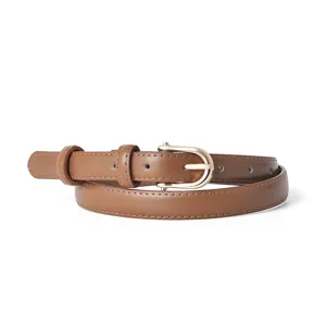 Women casual slim leather belt featuring gold D-buckle, versatile jeans trouser accessory.