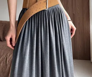 Stylish wide brown suede waist belt for women, trendy accessory for dresses and jeans.