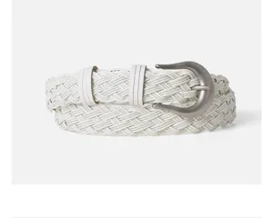 White braided women belt detail showing intricate texture, retro buckle, casual daily wear.