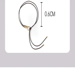 Detail shot of thin brown PU leather cord waist belt showing 0.6cm width specification.