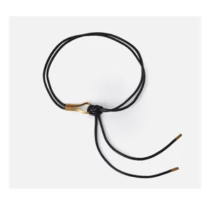 Detail view of women PU leather rope belt with gold metal ring and elegant knot design.