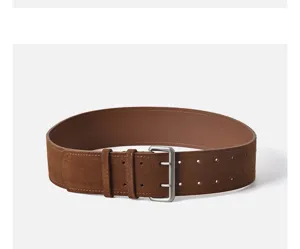 Close-up detail of a wide brown suede leather belt featuring a sturdy metal double pin buckle.