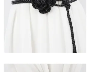 Women black braided waist belt with elegant crochet flower decoration for dresses and skirts.