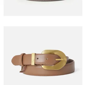Detailed view of brown leather belt with retro gold metal buckle for women pants styling.