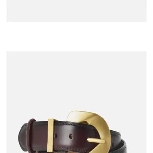 Close-up detail view of retro women genuine leather belt featuring large gold metal buckle.