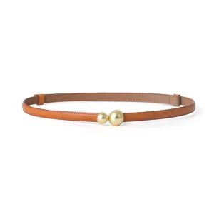 Slim brown leather belt for women with elegant double gold sphere buckle, versatile waist strap.