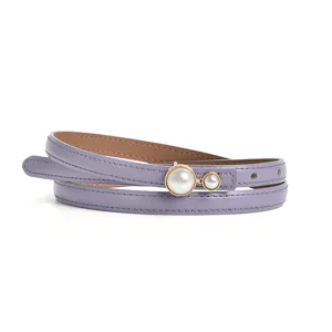 Purple leather thin waist belt with dual pearl buckle, minimalist style for dresses.