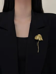 Exquisite gold-tone pleated ginkgo leaf brooch detail, vintage metal accessory pin for blazers.