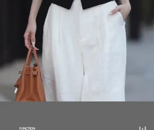 Women casual trousers detail view showcasing high quality fabric and fashionable styling.
