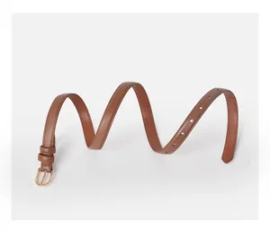 Detailed view of women brown leather belt with minimalist golden buckle and classic stylish design.