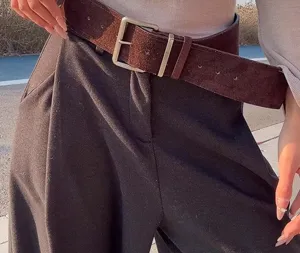 Brown suede wide belt detail shot featuring a sturdy metal pin buckle for women's outfits.