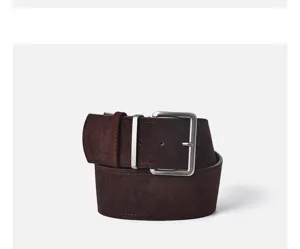Dark brown suede women's belt detail closeup, featuring a minimalist alloy pin buckle.