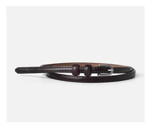 Minimalist dark brown women's skinny leather belt with silver buckle for stylish casual outfits.