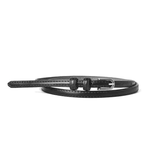 Elegant slim black leather belt for women with silver buckle, perfect for dresses and jeans.