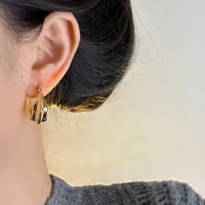 Minimalist irregular gold geometric metal earrings for women, retro chic daily ear studs.