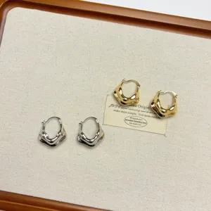 Chic minimalist irregular metal hoop earrings, vintage geometric design for women, gold and silver.