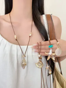 Bohemian ocean style starfish seashell necklace detail, beach vacation adjustable choker accessory.