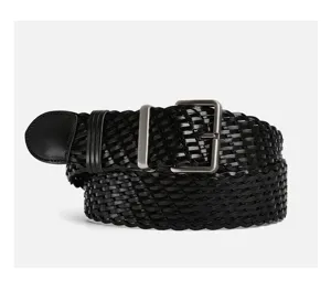 Close-up detail of black woven leather belt for women, textured braided surface and metal buckle.