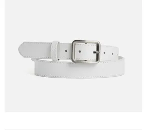 White leather belt detail, classic silver square pin buckle, fine stitching craftsmanship.