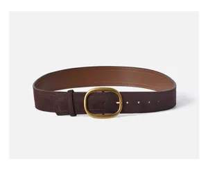 Detailed view of the dark brown suede leather belt with a vintage brass oval metal buckle.