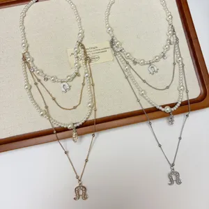 Vintage multi-layer pearl necklace with horseshoe pendant elegant beaded jewelry for women