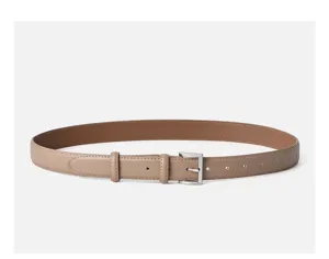High quality leather belt detail view showcasing exquisite stitching and silver metal buckle.