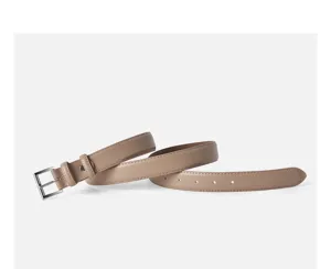 Women leather belt detail view showcasing fine stitching, metal buckle, and premium texture.