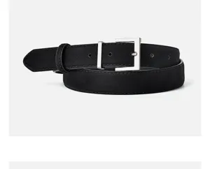 Close-up detail of the black suede leather belt with silver square buckle, elegant style.