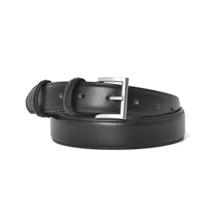 Classic black leather belt for women, versatile waist accessory with silver buckle for jeans.