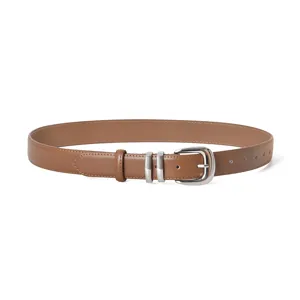 Women brown leather belt with silver metal buckle, stylish casual waist strap for jeans.