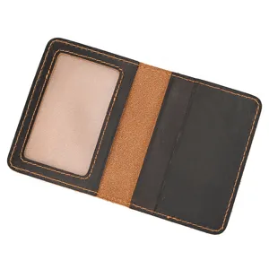 Detailed shot of genuine crazy horse leather card holder with ID window and slots.